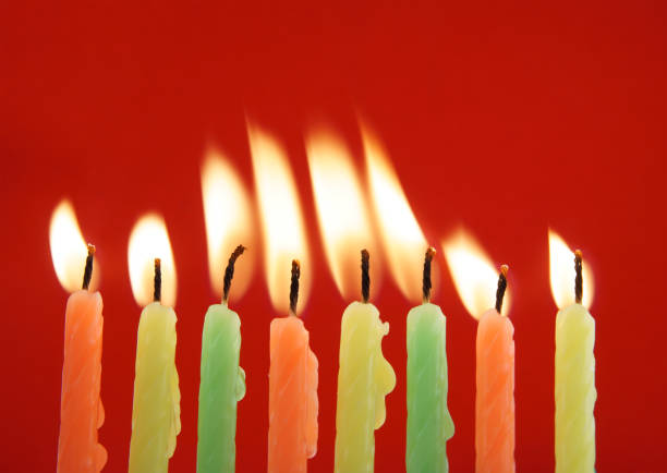 istock Birthday candles on red 1179167933