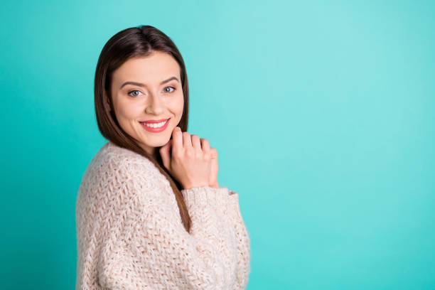 istock Copyspace photo of charming cute cheerful optimistic grateful girlfriend wearing knitted pullover isolated over teal color vibrant background 1179173826