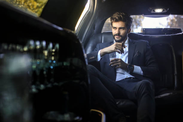 istock Businessman in a limo 1179176450