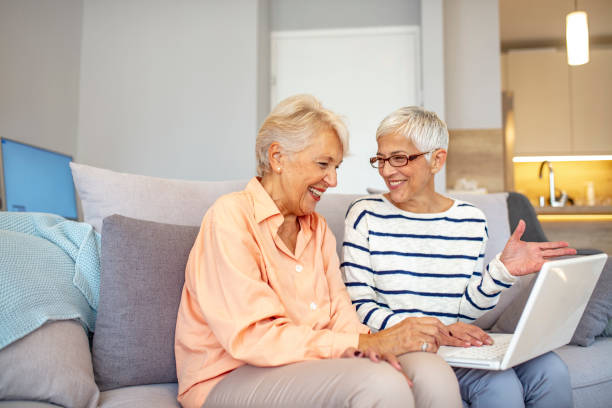 istock Two old women and laptop. 1179177810