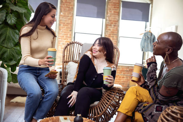 istock Three friends relaxing at home on the weekend 1179180663