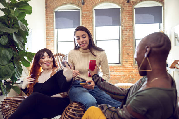 istock Three friends relaxing at home on the weekend 1179180693