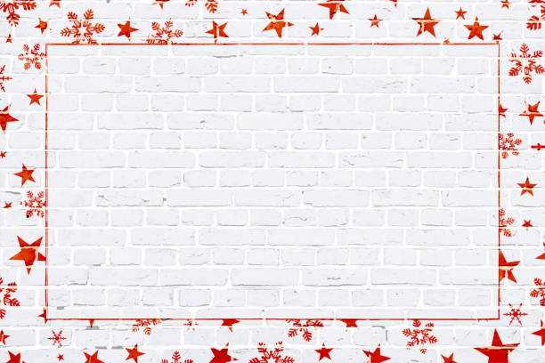 vektor-illustration eines weihnachtsthema foto oder bilderrahmen in leuchtend rot gefärbten elemente schneeflocken, sterne, umgeben / machen einen rand eines grunge strukturierte ziegelwand - christmas theme stock-grafiken, -clipart, -cartoons und -symbole