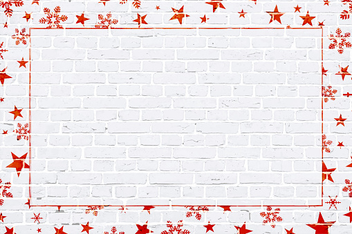 Vector Illustration of a Christmas background in bright red Christmas elements snowflakes, stars, surrounding/ making a border of an empty  white, light gray colored brick wall with rectangular blocks, textured grungy backgrounds. No text. No people, copy space, copyspace