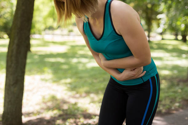 istock Fit woman having stomachache 1179185150