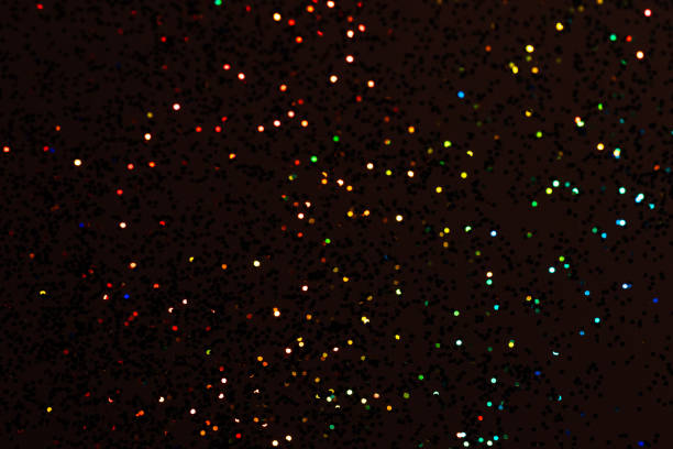istock Colorful prism confetti blurred festive backdrop, trendy sparkles and glitter background, flat lay style. Christmas and holidays concept 1179186191