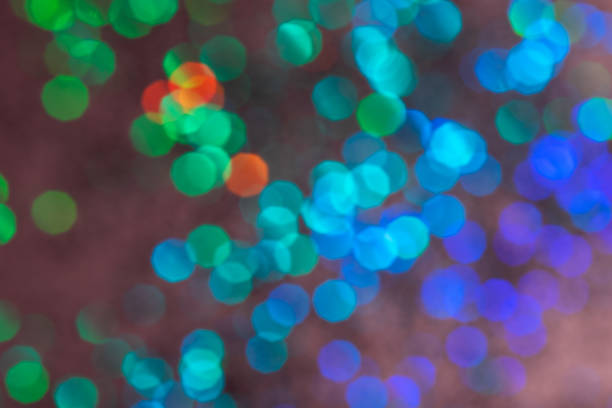 istock Colorful prism confetti blurred festive backdrop, trendy sparkles and glitter background, flat lay style. Christmas and holidays concept 1179186467