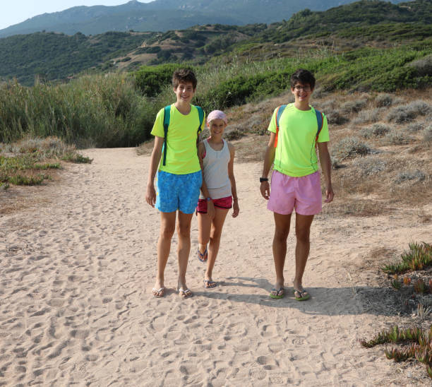 istock two young brothers and a little sister in summer 1179186771
