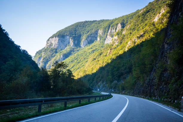 istock Asphalt road by the mountain 1179187305