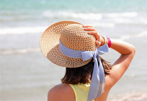 istock Young girl with straw hat 1179187463