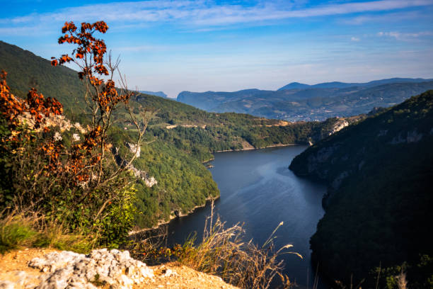 istock River surrounded by the hills and mountains 1179193166