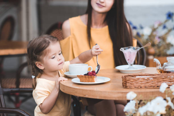 istock Mother with daughter in cafe 1179193446
