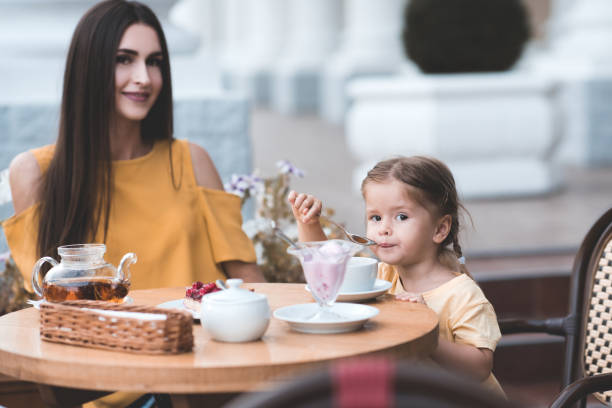 istock Mother with daughter in cafe 1179193818