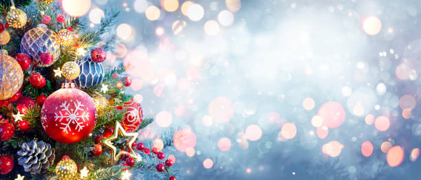 istock Christmas Tree With Ornament And Bokeh Lights In Snowy Background 1179194667