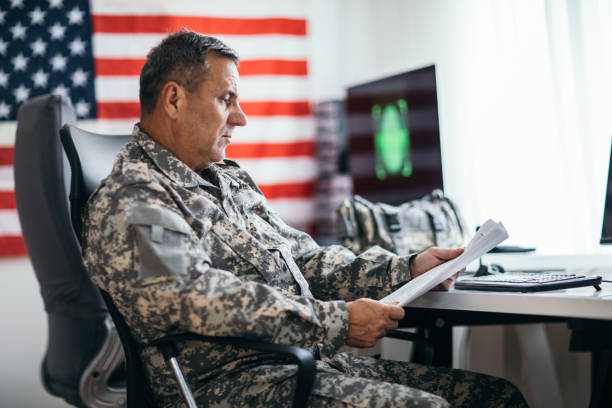 istock Senior US soldier reading report 1179194733