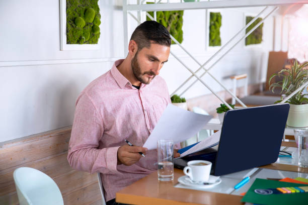 istock Busy man productivity on job using internet wifi 1179199128