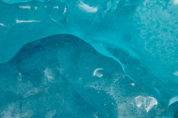 istock Clerar blue glacier ice texture. Clean frozen water 1179200078