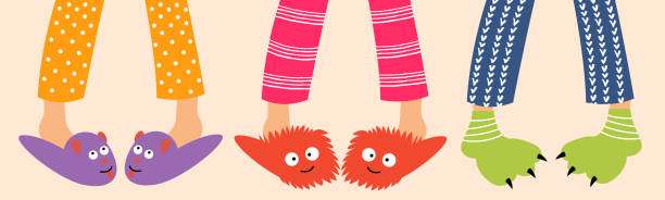 Children's feet in funny slippers Children's feet in funny slippers. Children in pajamas spend the night with friends. Pajama party. Vector editable illustration pyjamas stock illustrations