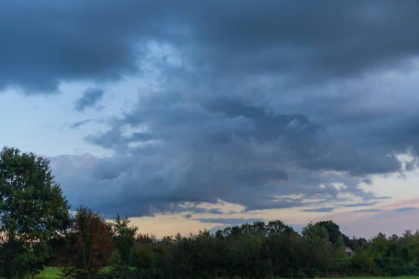 threatening  cloud formations in the sky from the coming storm, while the blue of the sky is still visible
