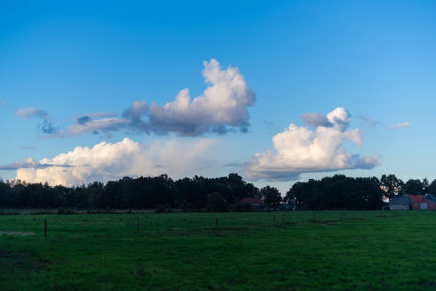 interesting  cloud formations in the sky while the blue of the sky is still visible