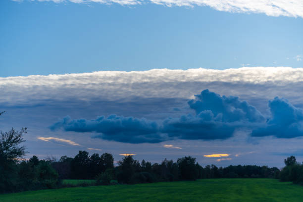 istock threatening cloud  formations in the sky from the coming storm, while the blue of the sky is still visible 1179203528
