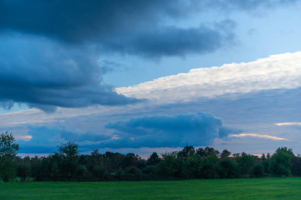 threatening  cloud formations in the sky from the coming storm, while the blue of the sky is still visible