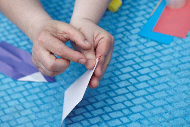 istock Origami paper pencil 1179204523