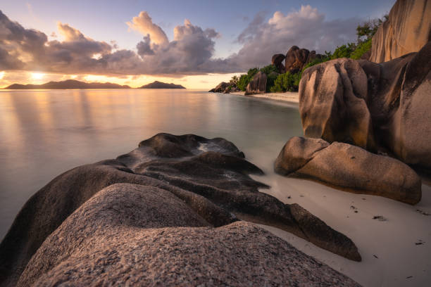 istock Sunset at exotic Anse Source d'Argent beach, La Digue island, Seychelles 1179205765