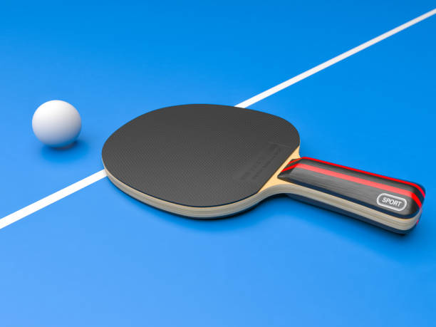 istock Black table tennis racket with ball. On blue background 1179207371