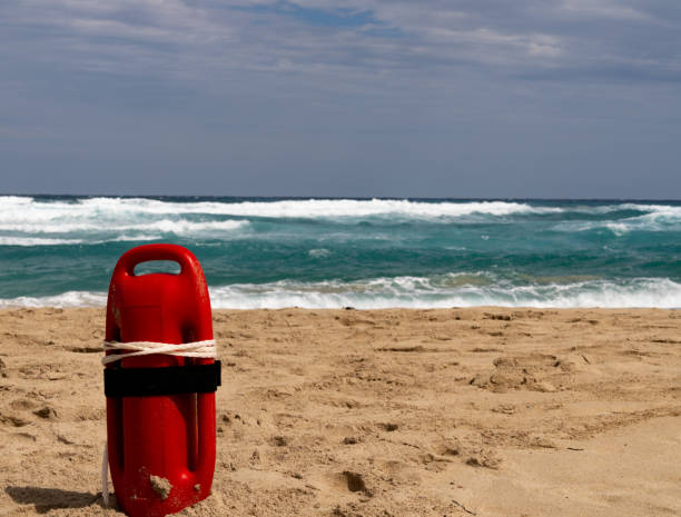 istock Red baywatch buoy at beach 1179209036