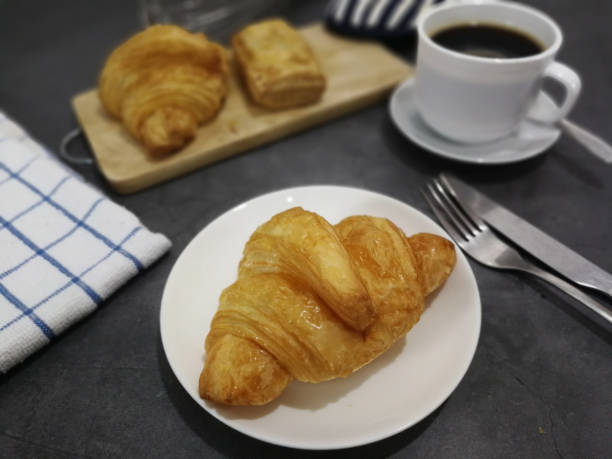 istock Croissant and Chicken Pie with black coffee 1179211446