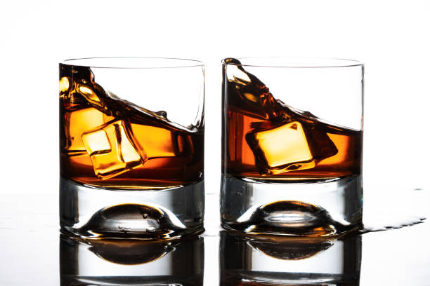istock glass of whiskey with ice cubes 1179222122