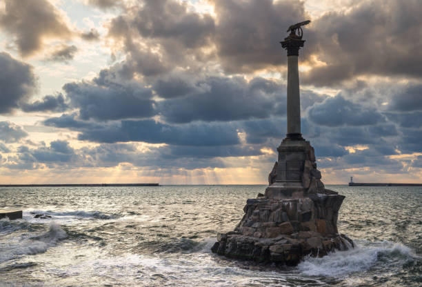 Stormy Sevastopol in Crimea. Monument to sunken ships Stormy Sevastopol in Crimea. Monument to sunken ships scuttle stock pictures, royalty-free photos & images