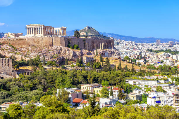 istock Athens in summer, Greece. Famous Acropolis hill rises above cityscape. 1179230940
