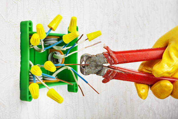 istock Splicing wires together with twist-on wire nut. 1179231099