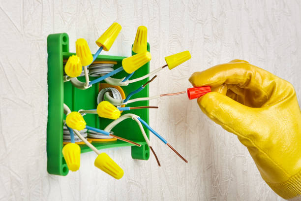 istock Twist-on wire connectors used in a junction box. 1179231127