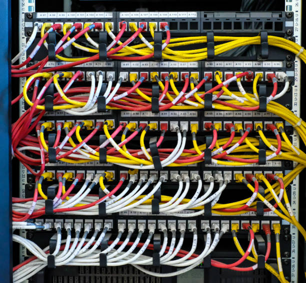 istock Many wires connect to the network interfaces of powerful Internet servers. Racks with computer equipment in the server room data center. 1179234144
