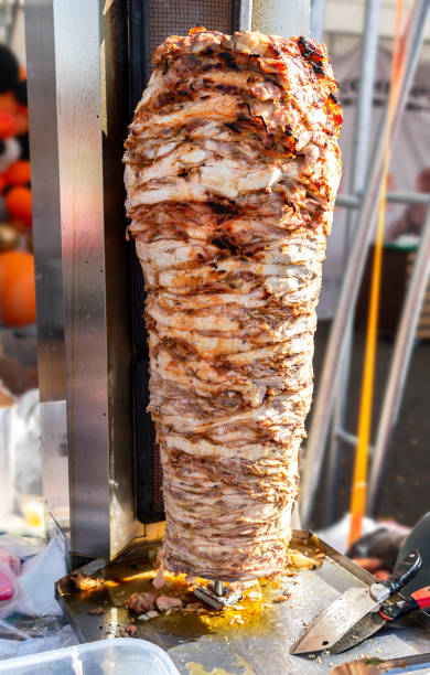 istock Fast food doner kebab meat on a rotary grill 1179234214