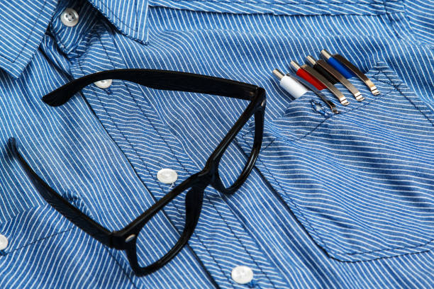 istock Shirt, eyeglasses and colorful pens 1179235304