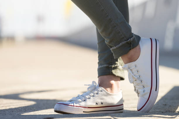 istock Woman wearing white sneakers 1179235572