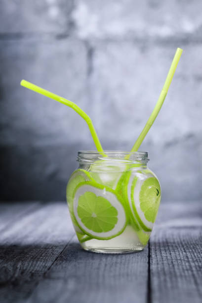 istock Can of homemade lemonade with lime, rustic. 1179235716
