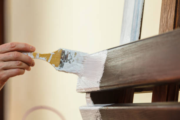 istock Person renovating wooden hanger 1179237729