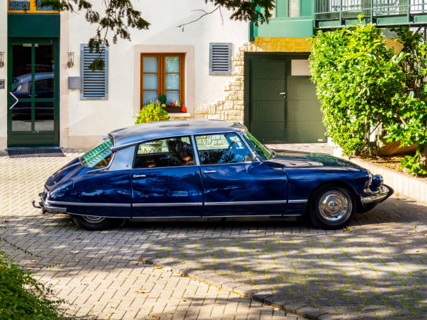 Vianden, Luxembourg - October 23, 2012: Beautiful shiny dark blue old Citroen DS 21 Pallas from 1965, side view