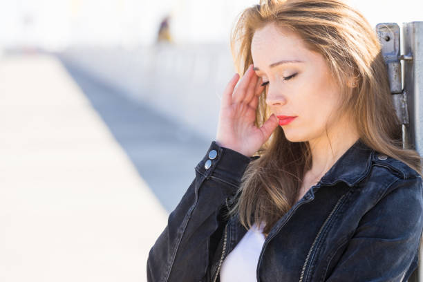 istock Sad woman walking outdoor 1179239457