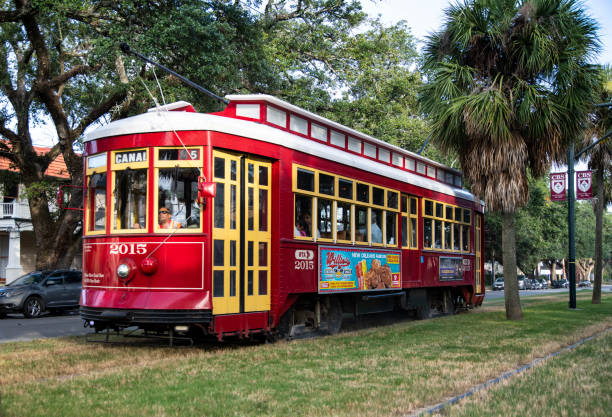 New Orleans streetcar Bright red streetcar on the Canal Street line in New Orleans. The line is one of five streetcar lines in New Orleans. It began operating in 1861 and was rebuilt and reopened in 2004. 
New Orleans, Louisiana
September 29, 2019. robertmichaud stock pictures, royalty-free photos & images