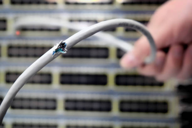istock Broken cable to connect to the Internet. Network connection terminated. Damage in the global communication channel internet, WAN. 1179248592