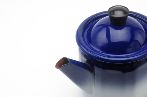 istock Vintage teapot in blue on a white background 1179254764
