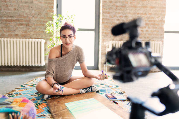 istock Creative girl uses vlogging to promote her art 1179265316