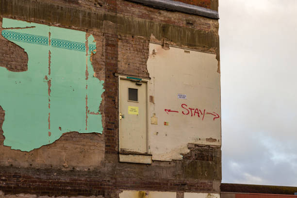 istock Second floor doorway leads to open air during building work 1179266084