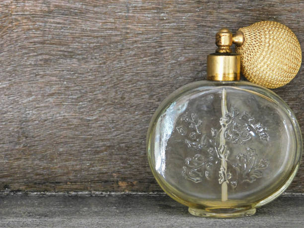 istock Close up of antique perfume bottle with atomizer, on shelf 1179271718